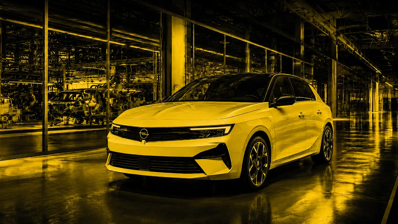 Opel Astra v modernej nemeckej výrobnej hale symbolizuje ponechanie výroby modelu v domácej továrni.